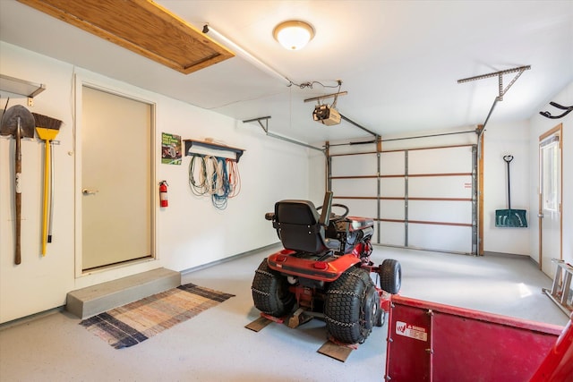 11690 Harbor Ln, Ideal Twp, MN 56442 - garage featuring a garage door opener