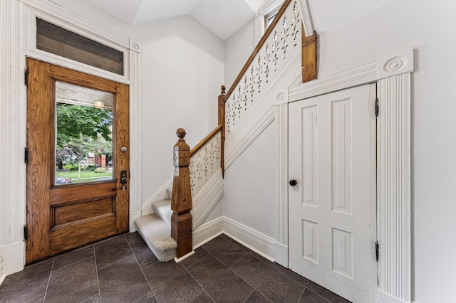492 Dayton Ave, Saint Paul, MN 55102 - foyer entrance featuring stairs and baseboards
