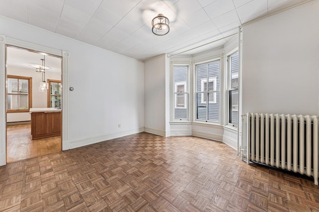 492 Dayton Ave, Saint Paul, MN 55102 - empty room featuring radiator and baseboards