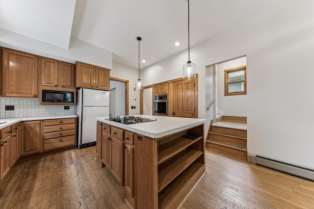 492 Dayton Ave, Saint Paul, MN 55102 - kitchen featuring freestanding refrigerator, open shelves, oven, cooktop, and black microwave