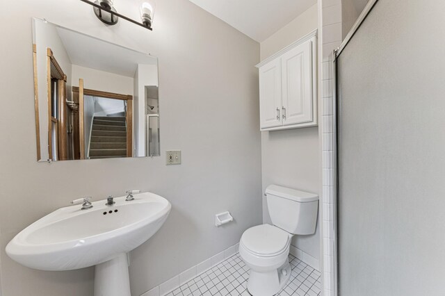 492 Dayton Ave, Saint Paul, MN 55102 - full bathroom with tile patterned flooring and a shower with shower door