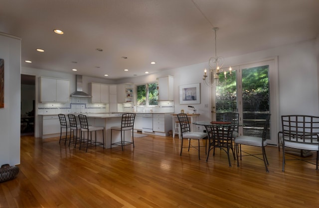 6323 Timber Trl, Edina, MN 55439 - dining space with light wood-style flooring, a chandelier, and recessed lighting