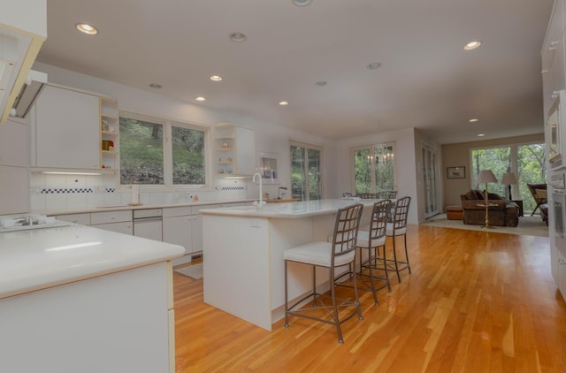 6323 Timber Trl, Edina, MN 55439 - kitchen featuring open shelves, light wood-style floors, white cabinetry, recessed lighting, and white cooktop