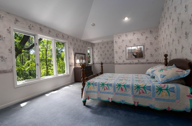 6323 Timber Trl, Edina, MN 55439 - carpeted bedroom featuring lofted ceiling, wallpapered walls, and baseboards