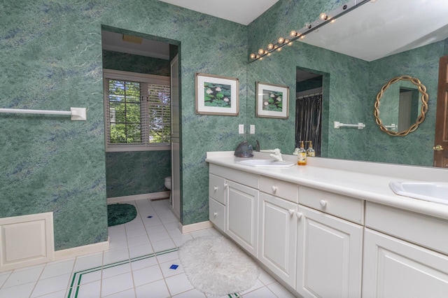 6323 Timber Trl, Edina, MN 55439 - full bathroom featuring double vanity, tile patterned floors, and toilet