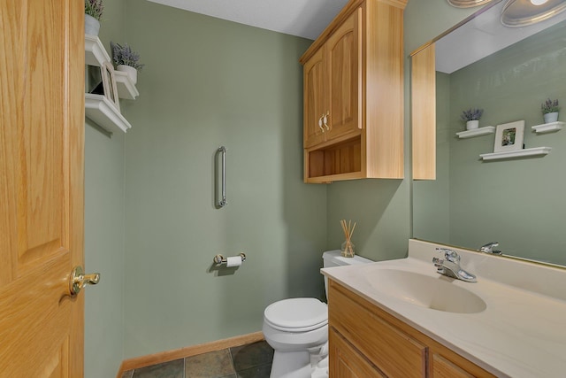 8081 45th Ave SW, Raymond, MN 56282 - bathroom featuring toilet, vanity, baseboards, and tile patterned floors