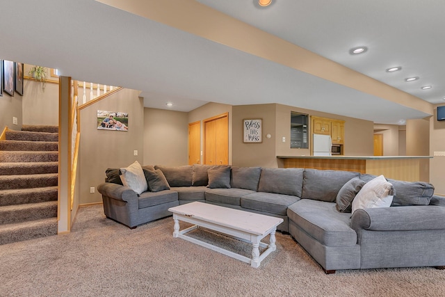 8081 45th Ave SW, Raymond, MN 56282 - living room with light carpet, stairway, recessed lighting, and baseboards