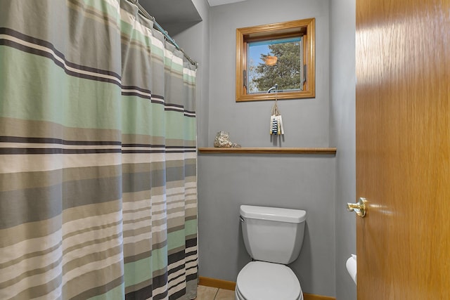 8081 45th Ave SW, Raymond, MN 56282 - bathroom with toilet, tile patterned floors, and a shower with shower curtain