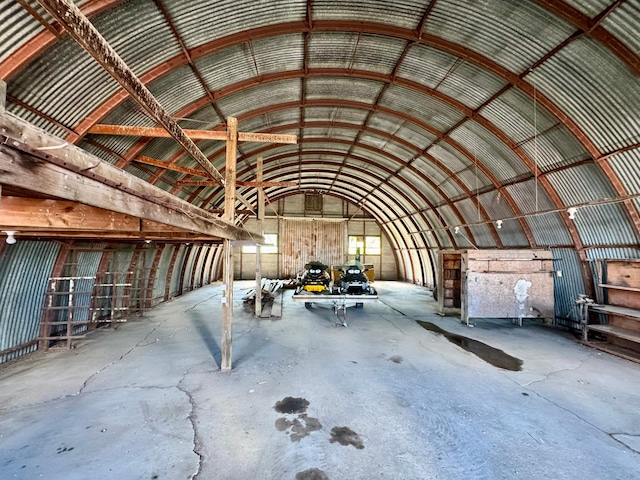 8081 45th Ave SW, Raymond, MN 56282 - misc room featuring concrete flooring and lofted ceiling