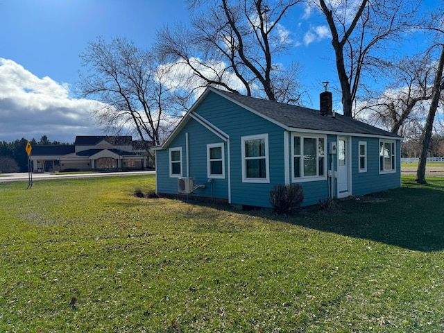 115 Mn Highway 78 N, Ottertail, MN 56571 - view of side of property with a chimney and a yard