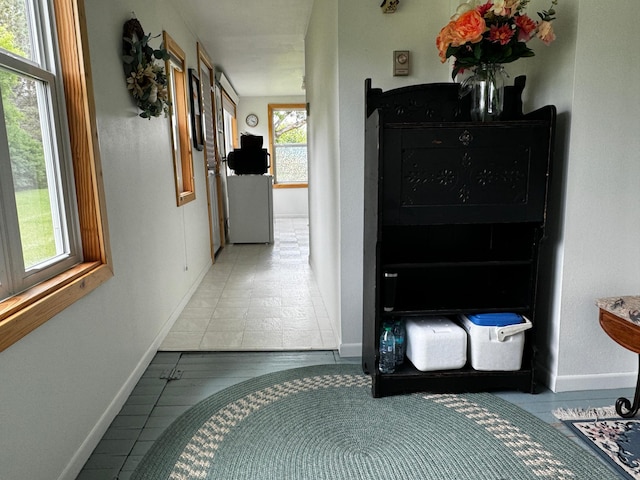 115 Mn Highway 78 N, Ottertail, MN 56571 - corridor with baseboards and tile patterned flooring
