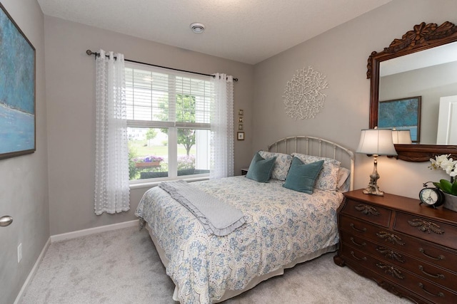 4745 Copper Cir, Woodbury, MN 55129 - bedroom featuring light carpet and baseboards