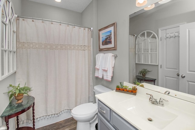 4745 Copper Cir, Woodbury, MN 55129 - bathroom with vanity and wood finished floors