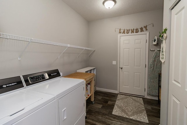 4745 Copper Cir, Woodbury, MN 55129 - washroom featuring dark wood-style floors, washer and clothes dryer, and a textured ceiling