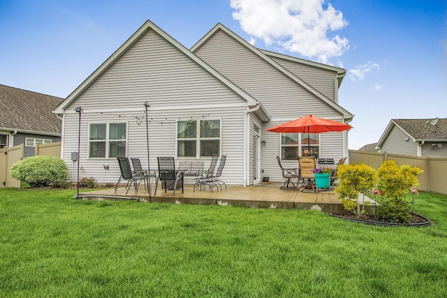 4745 Copper Cir, Woodbury, MN 55129 - rear view of house featuring a patio area