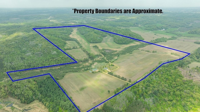 N12011 County Road Ss, Otter Creek Twp, WI 54772 - overview of rural landscape featuring property parcel outlined and a forest