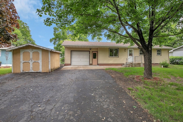 16736 County Road 49, Cold Spring, MN 56320 - ranch-style home featuring a garage and driveway