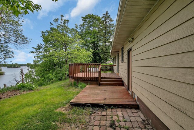 16736 County Road 49, Cold Spring, MN 56320 - wooden deck with a water view and a lawn