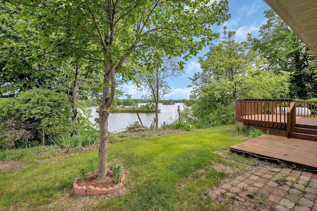 16736 County Road 49, Cold Spring, MN 56320 - view of green lawn featuring a deck with water view