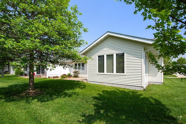 2475 Mossy Creek Dr NE, Owatonna, MN 55060 - view of side of property with a yard
