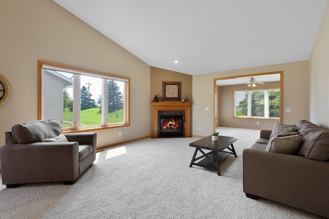 2475 Mossy Creek Dr NE, Owatonna, MN 55060 - living room with lofted ceiling, carpet, and a glass covered fireplace