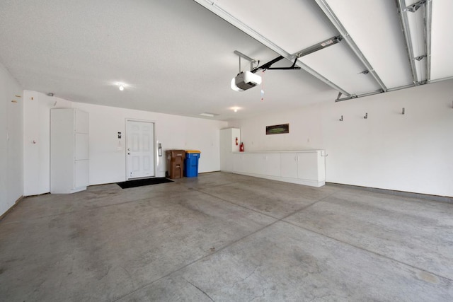 2475 Mossy Creek Dr NE, Owatonna, MN 55060 - garage with a garage door opener