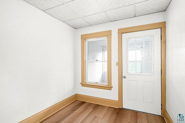 1006 87th Ave W Upper Unit, Upper Unit, Duluth, MN 55808 - entryway with a paneled ceiling, wood finished floors, and baseboards