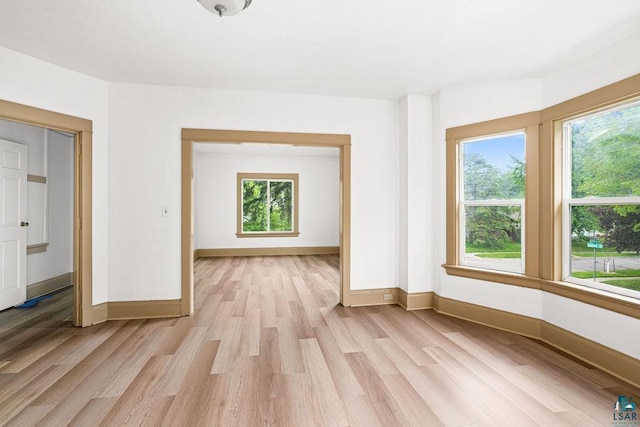 1006 87th Ave W Upper Unit, Upper Unit, Duluth, MN 55808 - spare room featuring light wood-style floors and baseboards