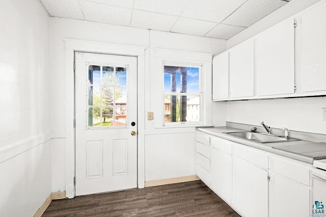 1006 87th Ave W Upper Unit, Upper Unit, Duluth, MN 55808 - kitchen featuring a sink, white cabinets, dark wood-style flooring, light countertops, and a drop ceiling