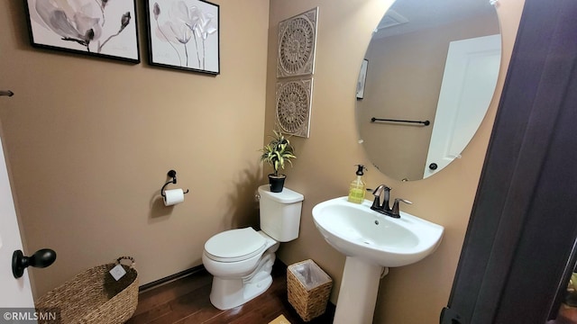 9695 Independence Cir Unit 4, Chanhassen, MN 55317 - bathroom featuring toilet, wood finished floors, and a sink