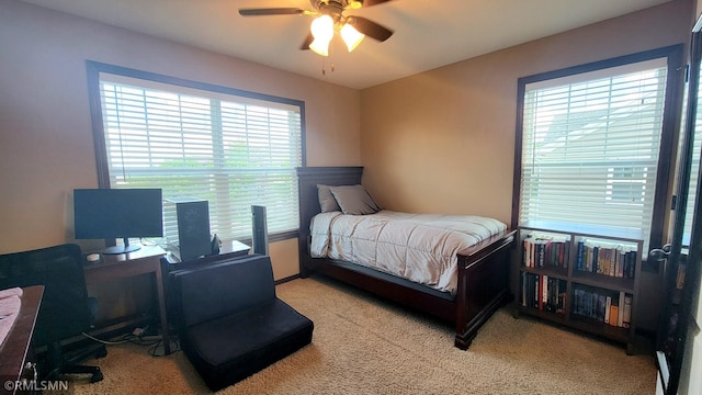 9695 Independence Cir Unit 4, Chanhassen, MN 55317 - carpeted bedroom featuring an office area and ceiling fan