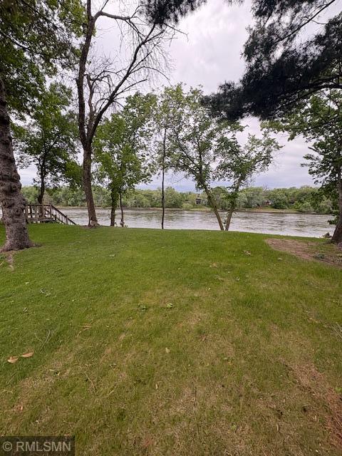 8456 Mississippi Blvd NW, Coon Rapids, MN 55433 - view of green lawn with a water view
