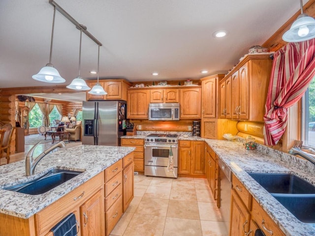 10719 Lumberjack Rd NW, Alaska Twp, MN 56667 - kitchen featuring appliances with stainless steel finishes, a sink, light stone countertops, decorative light fixtures, and log walls