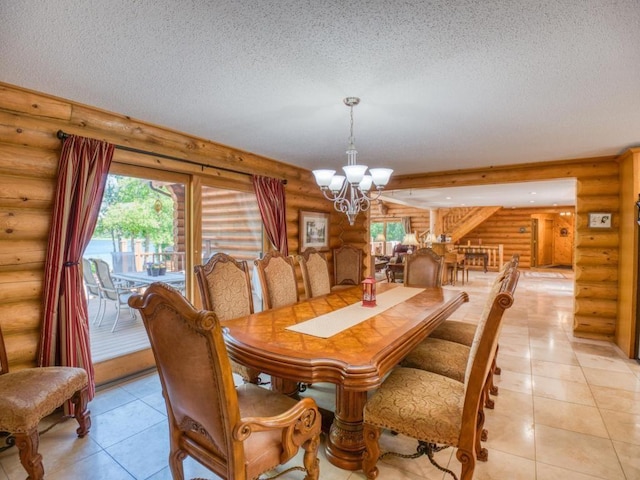 10719 Lumberjack Rd NW, Alaska Twp, MN 56667 - dining room with log walls, a chandelier, a textured ceiling, and light tile patterned flooring