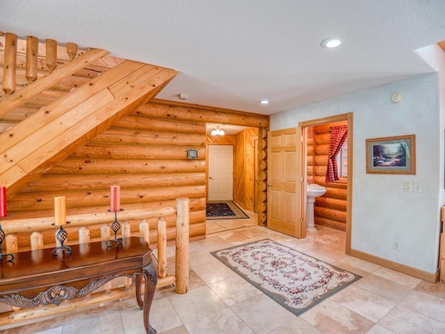 10719 Lumberjack Rd NW, Alaska Twp, MN 56667 - corridor with rustic walls, baseboards, and recessed lighting