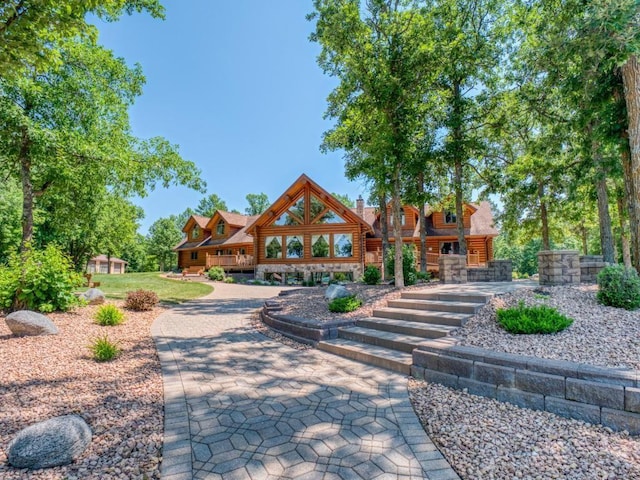 10719 Lumberjack Rd NW, Alaska Twp, MN 56667 - view of front of home featuring log exterior