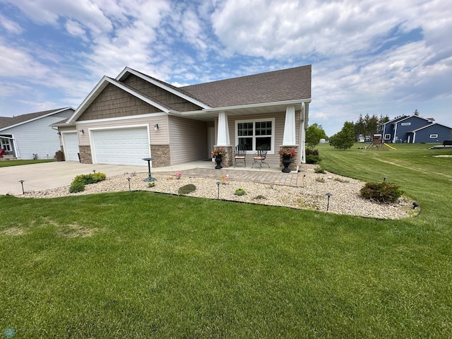 879 Longview Dr, Detroit Lakes, MN 56501 - craftsman inspired home featuring a front yard, a porch, a garage, concrete driveway, and stone siding