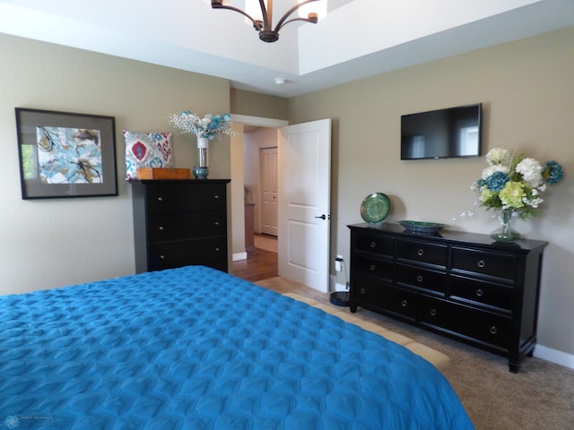 879 Longview Dr, Detroit Lakes, MN 56501 - carpeted bedroom with a chandelier