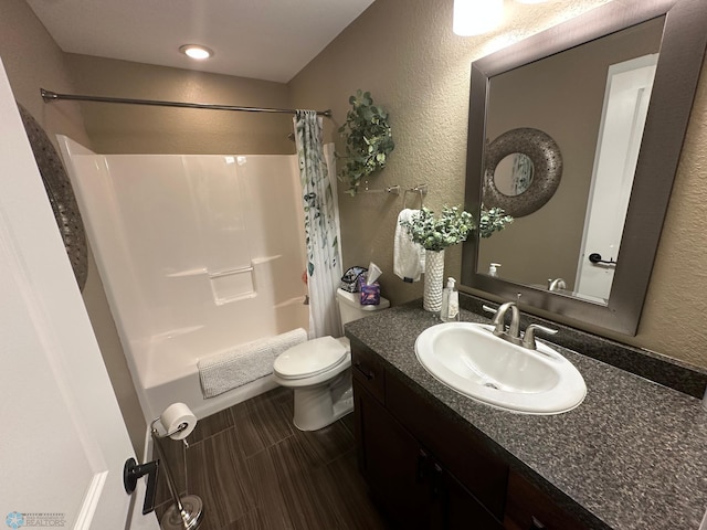 879 Longview Dr, Detroit Lakes, MN 56501 - bathroom featuring vanity, toilet, shower / bath combo, and a textured wall