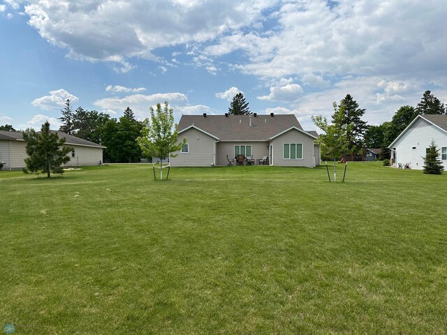 879 Longview Dr, Detroit Lakes, MN 56501 - back of property with a lawn