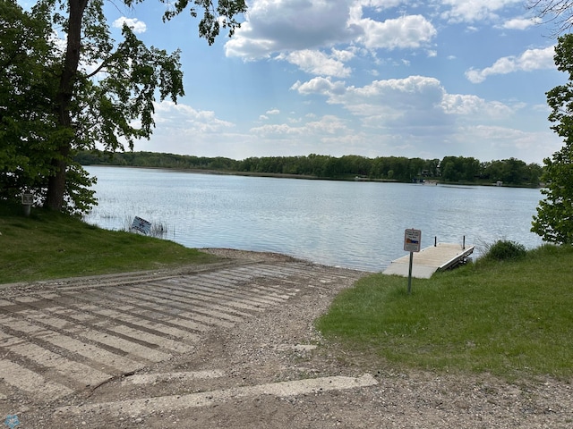 879 Longview Dr, Detroit Lakes, MN 56501 - water view featuring a boat ramp and a boat dock