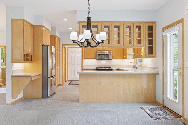9536 Windflower Pl, Champlin, MN 55316 - kitchen featuring stainless steel appliances, plenty of natural light, light countertops, and recessed lighting