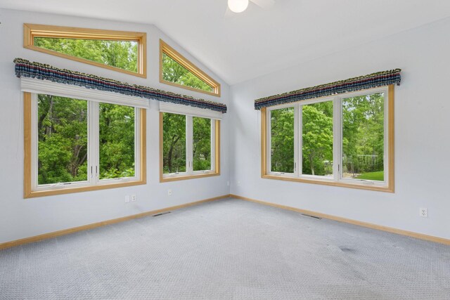 9536 Windflower Pl, Champlin, MN 55316 - carpeted empty room featuring baseboards, lofted ceiling, and ceiling fan
