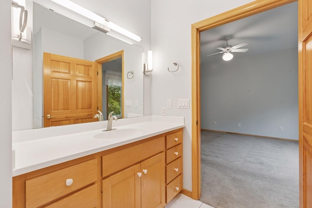 9536 Windflower Pl, Champlin, MN 55316 - bathroom with a ceiling fan, baseboards, and vanity