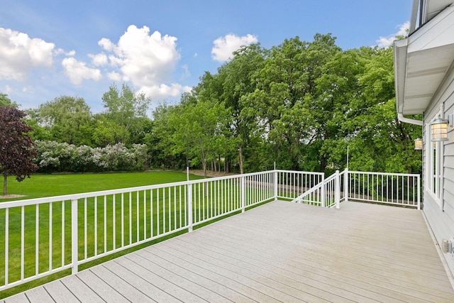 9536 Windflower Pl, Champlin, MN 55316 - deck featuring a lawn and view of wooded area