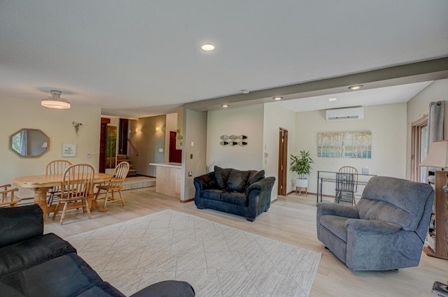 1970 Saint Croix Trl N, West Lakeland Twp, MN 55082 - living room with a wall mounted air conditioner, light wood finished floors, and recessed lighting