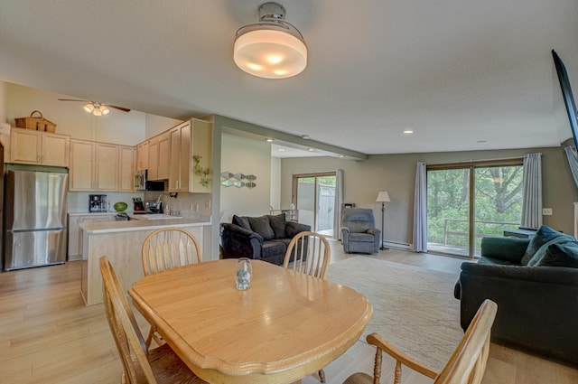 1970 Saint Croix Trl N, West Lakeland Twp, MN 55082 - dining area featuring light wood-style floors, ceiling fan, baseboard heating, and recessed lighting