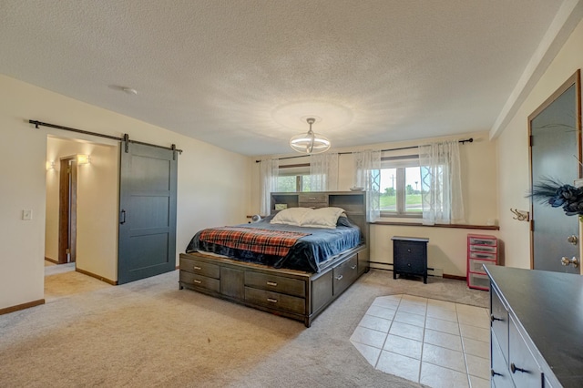 1970 Saint Croix Trl N, West Lakeland Twp, MN 55082 - bedroom with a barn door, light carpet, a chandelier, a textured ceiling, and a baseboard radiator