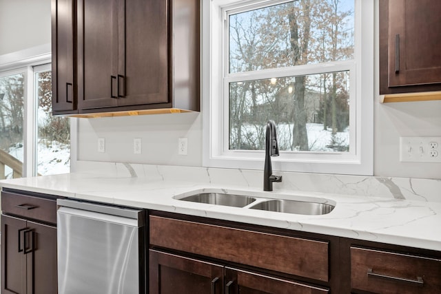 1700 Misty Cir, Buffalo, MN 55313 - kitchen featuring stainless steel dishwasher, dark brown cabinets, a sink, and light stone countertops