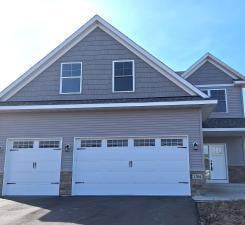 1700 Misty Cir, Buffalo, MN 55313 - view of front of property featuring driveway and a garage